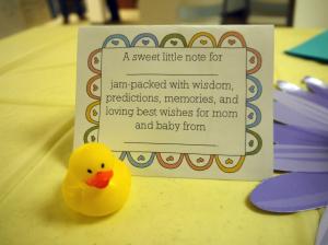 I asked everyone to fill these out, and then after the shower, I strung them all together with ribbon to make a little booklet for myself. :)