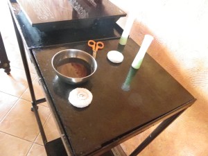 In the small bowl is the "gallon" of oil