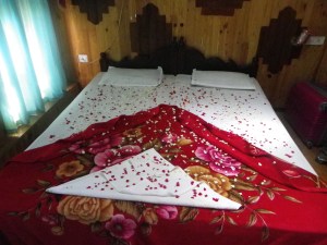 Flower covered bed in the air-conditioned bedroom
