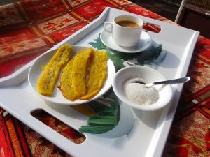 Tea and banana fritters, and the cook served it to me on the upper deck.