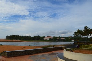 View looking from the beach back to the lake. There is a passage of water that connects the Arabian Sea to Veli Lake.