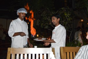I think I forgot to mention that they flambéed the Christmas pudding in front of us.