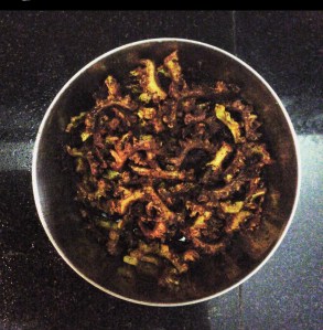 Photo showing karela/bitter gourd/pavakka fry. 